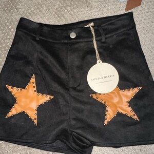 Saints & Hearts Black High Waist Shorts with Orange Star Details